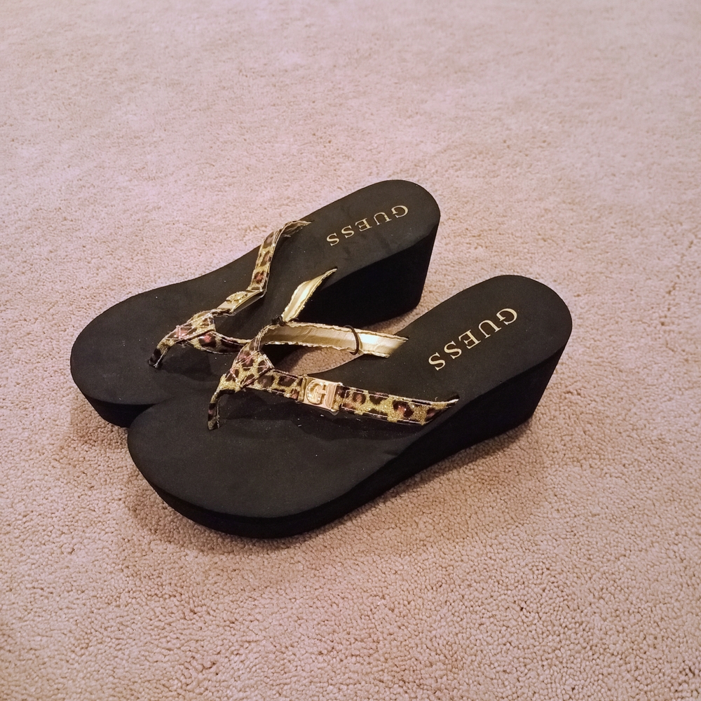 GUESS Women's Black and Gold Wedge Sandals